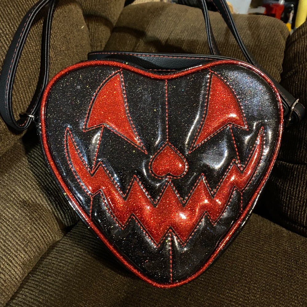 Love pain and stitches heart bag